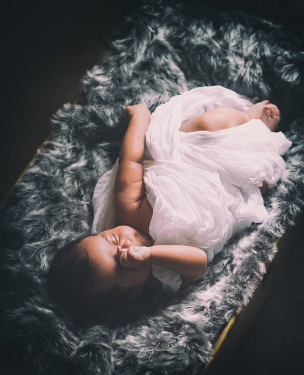 newborn-photography-baby-in-crib-prop
